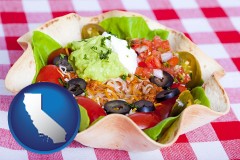 california map icon and a texmex taco salad in a baked tortilla