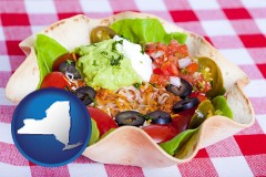 new-york map icon and a texmex taco salad in a baked tortilla